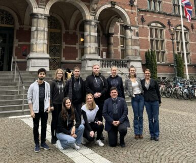 The funded PhD researchers together with Dr. Adi Stoykova and Police Superintendent Dr. Nina Sunde in front of the academia of the university of Groningen.